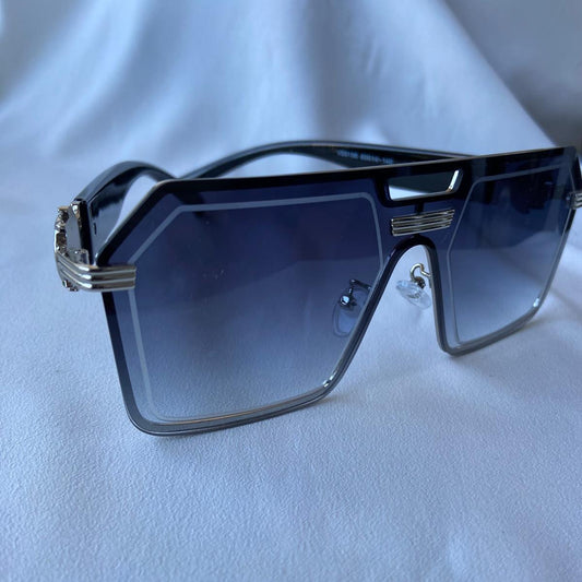 Lentes futuristas gris con detalles metálicos